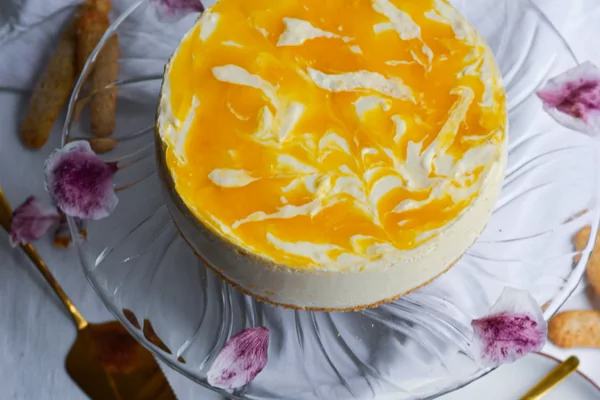 Suikervrije mango swirl kwarktaart